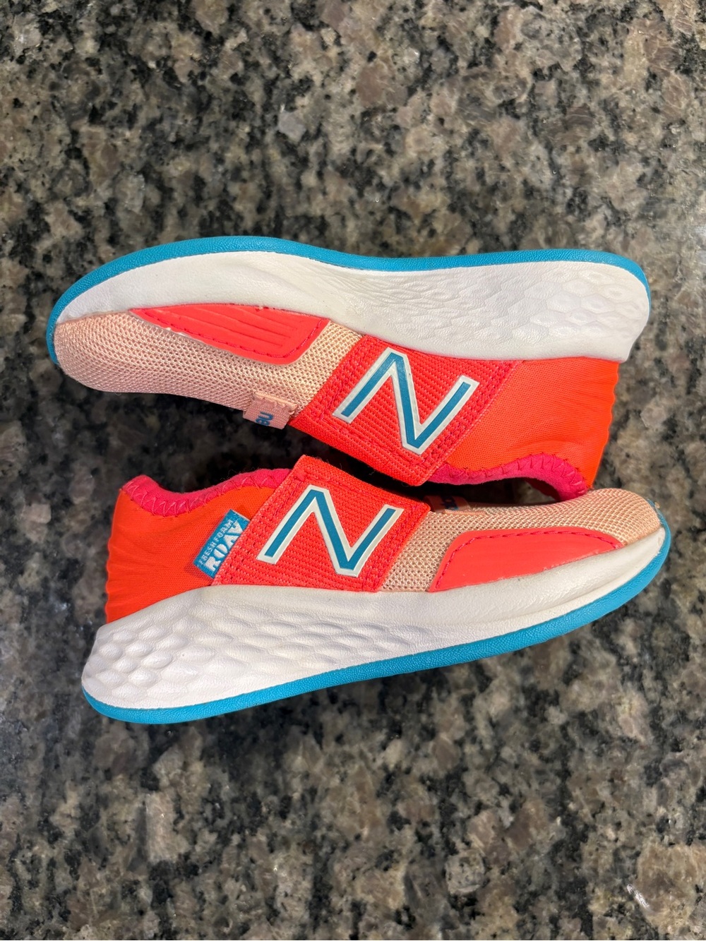 New Balance Kids Coral & Pink Slip-On Sneakers with Blue Accents